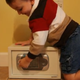 Illustration for article titled Kid Opens a Gun Safe Just by Jostling It Around